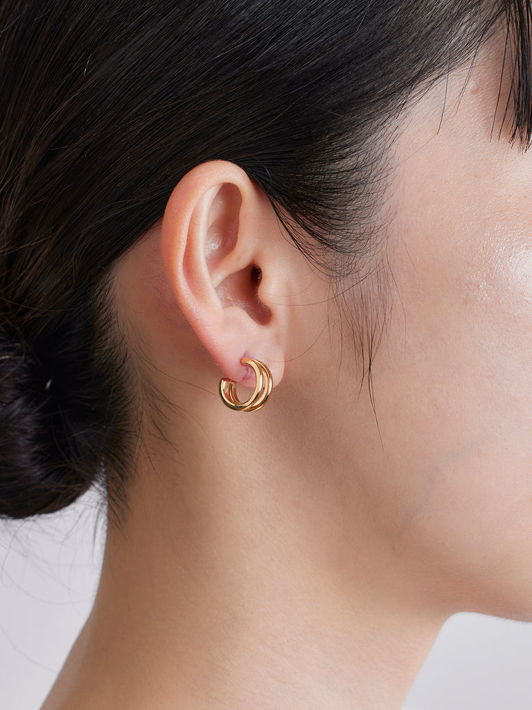 Saturn earrings in gold