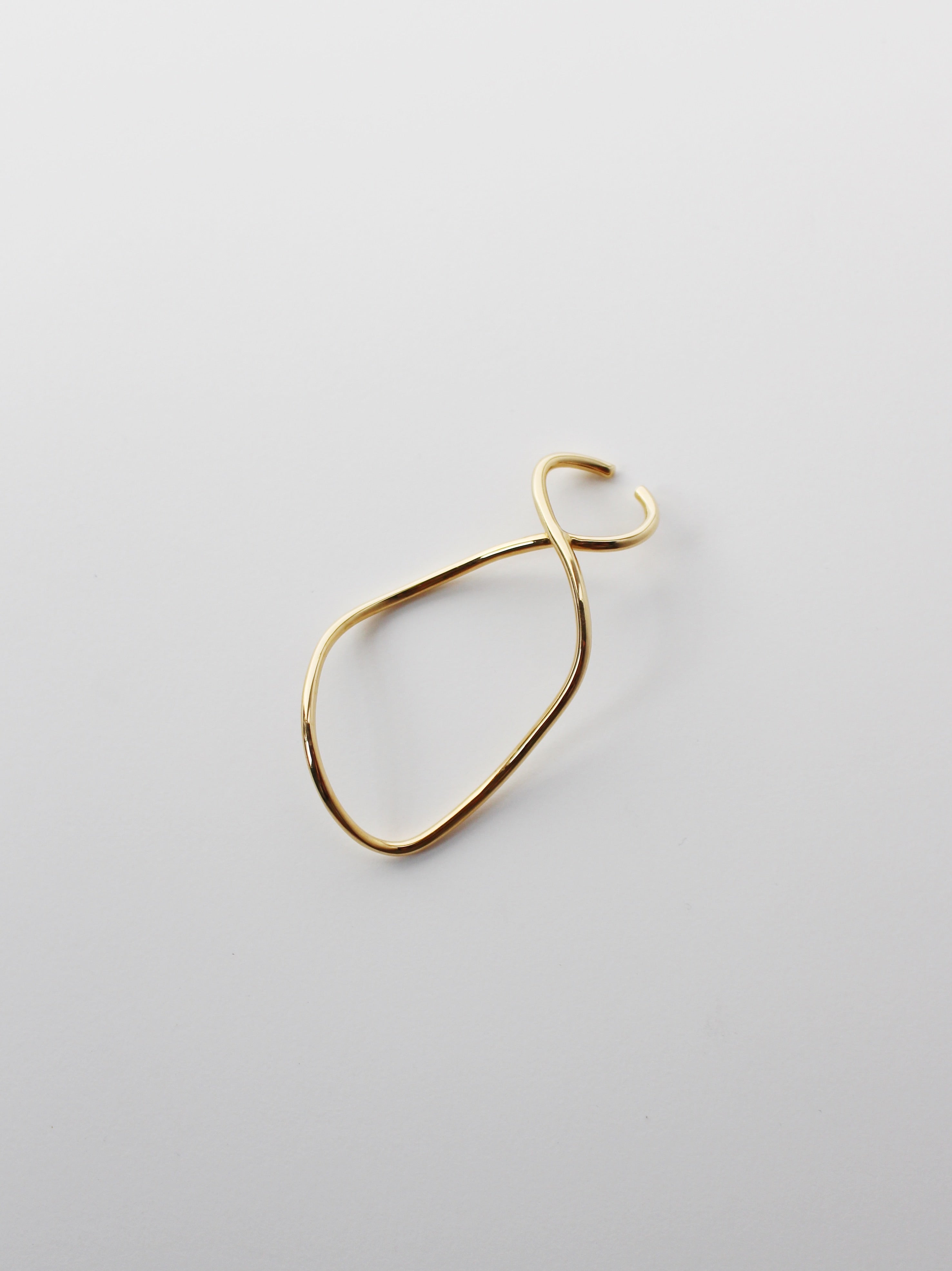 Void ear cuff in gold